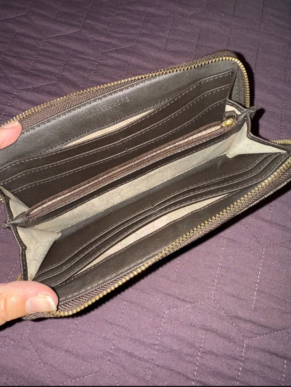 Michael Kors Black Zip Wallet with Gold Plaque
